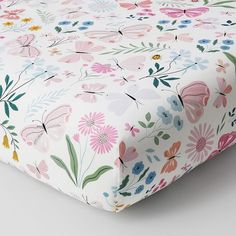 Transform their sleep space into a fresh springtime scene with our baby bedding. Featuring delicate butterflies floating among blooming wildflowers, the precious pastel set includes an organic cotton fitted crib sheet, a textural cotton quilt and a scalloped, linen crib skirt for a tailored finishing touch. DETAILS THAT MATTER Quilt Hand quilted of 100% BCI cotton. Filled with 100% polyester batting; 250-gram weight. Reverses to 100% cotton to a solid design. Crib Fitted Sheet Made from 100% org Flower Crib Bedding, Butterfly Crib Sheets, Butterfly Baby Room, Pottery Barn Crib, Organic Crib Sheets, Crib Fitted Sheet, Butterfly Nursery, Toddler Girl Room