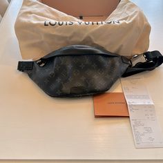 This Authentic Louis Vuitton, Monogram Bum Bag Is In Excellent Condition, And Has Only Been Carried On Three Occasions. Luxury Travel Belt Bag With Logo, Luxury Travel Belt Bag With Dust Bag Included, Designer Crossbody Belt Bag, Designer Everyday Bag With Logo, Black Monogram Canvas Bag With Logo, Designer Bags With Logo For Everyday Use, Black Designer Logo Bag For Everyday Use, Black Designer Logo Bag For Everyday, Travel Belt Bag With Branded Hardware