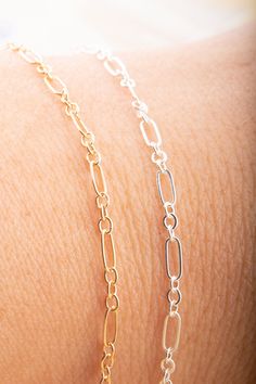 Long and Short Chain by Foot, Great for Permanent Jewelry, Bracelets 5mm x 4mm Metal Choices available: sterling silver and gold filled Choose from 3, 5, 10, 15, 20 and 25 feet Check out our chains section: https://www.etsy.com/shop/MilanPersonalized?ref=seller-platform-mcnav&section_id=39974974 Check out our connector charms section: https://www.etsy.com/shop/MilanPersonalized?ref=seller-platform-mcnav&section_id=39975070 Check out our birthstone connectors section: https://www.etsy.com/shop/Mi Silver Link Bracelet With Delicate Chain, Dainty Sterling Silver Link Bracelet, Silver Bracelets With Delicate Oval Link Chain, Silver Figaro Chain For Jewelry Making, Dainty Sterling Silver Link Chain Bracelet, Silver Dainty Oval Link Chain Bracelet, Minimalist Silver Bracelet With Figaro Chain, Silver Dainty Chain Link Bracelet, Minimalist Silver Figaro Chain Bracelet