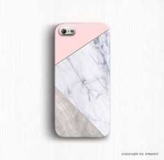 an iphone case with marble and pink in the middle, on a white table top