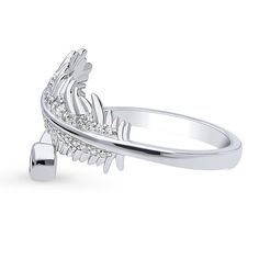 This feather bypass wrap ring adds a touch of vogue to your style with its dazzling and unique brilliance. Crafted with fine 925 sterling silver, rhodium plated, nickel free. Set with 0.36 ct.tw round cubic zirconia CZ (3mm - 1mm) in bezel and pave setting. Ring measures 3mm in height. Band measures 2mm in width. Adds a bling on your right hand with this fashion statement ring. Get the look of celebrity inspired jewelry. BERRICLE Cubic Zirconia (simulated diamond) jewelry are made with flawless Jewelry Education, Wrap Ring, Silver Feather, Pave Setting, Inspired Jewelry, Cz Ring, Wrap Rings, Statement Ring, Jewelry Care