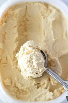 a scoop of ice cream in a white bowl