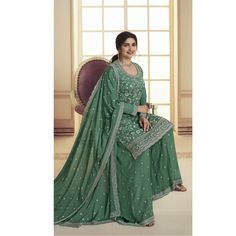 Fabric Details :- Top :- ChinonBottom :- ChinonDupatta - ChinonTop Length :- Max up to 38" to 40" InchesSize :- Max up to 54" InchesWork :- Heavy Embroidery WorkStyle :- Salwar Kameez Palazzo SuitsType :- Ready to Wear Wash :- First Time Dry Clean Festive Pista Green Salwar Kameez With Cutdana, Green Salwar Kameez With Straight Kurta For Reception, Wedding Salwar Kameez With Dori Work And Straight Kurta, Green Straight Kurta Salwar Kameez For Reception, Bollywood Style Semi-stitched Pista Green Churidar, Bollywood Style Churidar In Pista Green For Reception, Bollywood Style Pista Green Churidar For Reception, Pista Green Bollywood Salwar Kameez With Traditional Drape, Semi-stitched Pista Green Bollywood Churidar