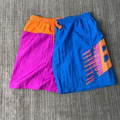 Vintage 90s New Balance Big Logo Running Sportswear Athletic Color Blocking 1990s Fashion Multi Color Track Shorts Small Mens Condition:  Excellent Used Condition  = No Flaws Measurements: Please see photos above for all measurements IF YOU BUY TWO OR MORE ITEMS USE THE CODE BUNDLE @ CHECK TO SAVE 20% WE SHIP WITHIN 24 HOURS AFTER PURCHASE! Please be aware that we do not offer free returns!! The Buyer is responsible for the cost of the return label.  Follow us on TikTok & Instagram @findsnostalg Multicolor Athletic Shorts For Streetwear, Multicolor Sporty Athletic Shorts For Sports, Sporty Multicolor Athletic Shorts For Sports, Casual Multicolor Athletic Shorts For Sports, Summer Casual Color Block Activewear, Casual Color Block Summer Activewear, Casual Summer Color Block Activewear, Casual Gym Shorts With Color Block, Casual Color Block Gym Shorts