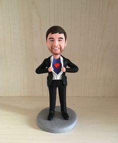 a custom bobble head figurine with a suit and tie