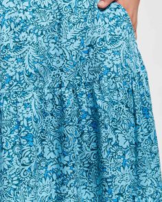 Score a breezy look with this plus size skirt, made for getaways and weekends with style on point Green Tiered Maxi Skirt For Summer, Blue Tiered Skirt For Spring, Green Voluminous Tiered Maxi Skirt, Blue Floral Print Tiered Skirt Dress, Blue Lined Tiered Skirt, Blue Tiered Lined Skirt, Blue Floral Print Dress With Tiered Skirt, Blue Tiered Skirt With Lining, Blue Tiered Skirt For Summer