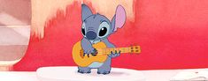 a cartoon elephant playing a guitar on top of a table