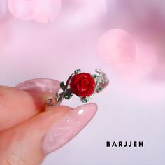 ✨Elevate your style with the enchanting Belle The Beauty Rose Ring, a captivating blend of elegance and allure. 🌹Our Ring Intricately fashioned and plated with either high-grade 925 Silver or gold of your choice, this ring boasts a stunning red rose, a timeless emblem of love and passion. 💫Dazzlingly plated in a luxurious blend of gold and silver, the Eternal Rose Ring exudes an opulent radiance that commands attention. 💍versatile piece that effortlessly complements any ensemble, it serves as Red Rose Ring, Ring Gold And Silver, Eternal Rose, Beautiful Red Roses, Rose Rouge, Rose Ring, Star Ring, Romantic Gift, Ring Gold