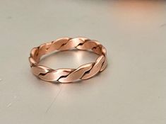 IF individually as ordered.  They are handmade, and not factory processed. This copper ring is 2 copper wires that I braid and flatten in my rolling mill. .   SIZE  16 gauge copper wire  1/4 inch wide PROCESS TIME The ring will be shipped within 1-3 days after ordering is completed.   SHIPPING  I use USPS first class mail service.  Each order will be mailed in a bubble lined envelope and in a gift box ready for gift giving.  It takes approximately 2-6 business days to arrive to destination.   RE Rolling Mill, Fingernail Polish, Jewelry Board, Braided Ring, Copper Ring, Jewelry Boards, Copper Rings, Fancy Jewelry, Great Christmas Gifts