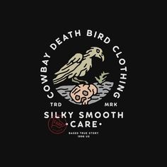 a black shirt with an image of a bird on it's chest and the words,