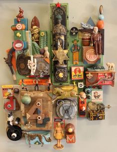 a clock made out of assorted items on a wall