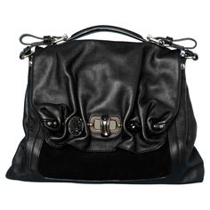 Black leather and suede shoulder bag with embellishments pieces Size: 45 cm X 30 cm X 10 cm One zipped pocket on the back of the bag and 2 flat pockets inside. Black leather piping inside. Strap length: 43 cm Early 2000s Shoes, Nina Ricci Bag, 2000s Shoes, Braided Bag, Rich Fashion, The Lone Ranger, Vintage Leather Bag, Leather Platform Sandals, Ladies Handbags