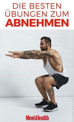 a man with tattoos on his arm and leg squatting in front of a white wall