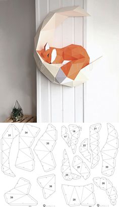 an origami fox is hanging on the wall with instructions to cut it out