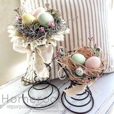 two bird's nests with eggs in them sitting on a window sill