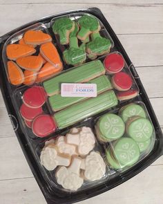 a tray filled with lots of different types of cookies