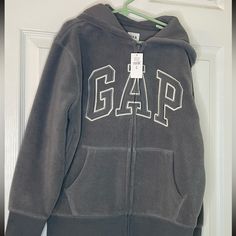 Gap Hooded Zip Sweatshirt Cheap Button-up Gap Outerwear, Gap Hooded Sweatshirt With Double-lined Hood, Gap Hooded Hoodie For Streetwear, Gap Hoodie Sweatshirt With Adjustable Hood, Gap Hoodie With Letter Print For Streetwear, Gap Winter Tops With Letter Print, Gap Tops With Letter Print For Winter, Gap Letter Print Tops For Winter, Sporty Hooded Sweatshirt By Gap