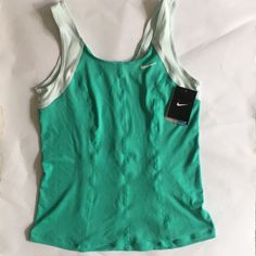 Women's Performance Tennis/Workout Top Made With Moisture-Wicking Dri-Fit Fabric To Keep You Dry. Vivid Teal With Contrasting Straps Green Fitted Sporty Top, Green Fitted Workout Tank Top, Sporty Fitted Green Tops, Fitted Green Tank Top For Workout, Green Workout Top For Spring, Nike Green Sleeveless Top, Tennis Fits, Tops Nike, Athletic Clothes