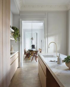 the kitchen is clean and ready to be used as a dining room or office space