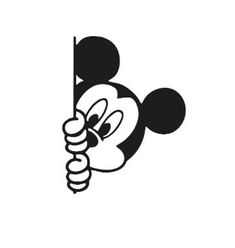 a mickey mouse holding onto a pole with his head peeking out from behind the pole