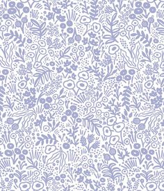 a white and blue floral pattern on a wallpaper with lots of small purple flowers