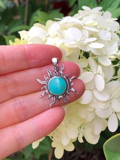 925 Sterling Silver Turquoise Sunburst Pendant - Metal: 925 Sterling Silver - Stone: Lab-Created/Synthetic Turquoise - Shape: Sunburst - Pendant Dimension:  Total Height includes Pendant Bail: 29mm(1.14 in); Pendant Bail's Inner Size: about 5mm x 3.5mm; Sunburst: 24mm(0.94 in), Thickness 2mm/0.9mm.  (Turquoise Stone: 11mm/0.43 in x 2mm.) (Please note that 24mm/0.94" is measured from point to point. Because of slim pointed shape, the actual pendant looks SMALLER.)   Color: Silver Turquoise Round Pendant Jewelry Stamped 925, Turquoise Gemstone Jewelry With Round Stone, Sterling Silver Turquoise Necklace With Natural Stones, Turquoise Necklace Stamped 925, Turquoise Gemstone Round Stone Jewelry, Spiritual Turquoise Jewelry Stamped 925, Handmade Turquoise Larimar Jewelry, Turquoise Round Spiritual Jewelry, Sterling Silver Jewelry With Sun Design