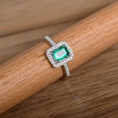 This is a lab emerald ring. The main stone is about 5mm*7mm emerald cut, weight about 0.85 carats.The basic metal is sterling silver and plated with rhodium.To change the metal to a solid gold (white/rose) or platinum is also available, please ask for a quotation if you want.You can also go to my shop Home for more elegant rings: https://www.etsy.com/shop/godjewelry?ref=hdr_shop_menuEmerald is May birthstone.More emerald rings:https://www.etsy.com/shop/godjewelry?ref=hdr_shop_menu&section_id Emerald Ring Silver, Elegant Rings, Emerald Band, May Birthstone Rings, Emerald Rings, Emerald Gem, Ring Emerald, May Birthstone, Green Gems