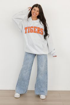 Bring the energy of the game to your wardrobe with our Clemson Tigers oversized premium weight hoodie with ribbed cuff and waistband. Be the ultimate Clemson Tigers fan with this versatile and trendy item. Sporty Sweatshirt With Drawstring Hood For Game Day, College Sportswear Hoodie With Letter Print, Casual Athletic Heather Hoodie For College, Casual Activewear With Drawstring Hood For Sports Events, College Hoodie With Ribbed Cuffs In Athleisure Style, College Athleisure Hoodie With Ribbed Cuffs, Sportswear Hoodie Sweatshirt For College, Letter Print Sportswear Hoodie For College, Casual College Hoodie In Athletic Heather