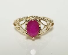 "Thanks for shopping our vintage estate store. We tend to sell well below wholesale and truly hope you enjoy all of our items. Many of the items are one of a kind, so please enjoy scrolling through the pictures and hopefully something will catch your eye. Spots are from reflections or camera. Estate 14k yellow gold natural Serengetti 1ct oval red ruby filigree ring. No scratches on the gem. Stunning. Vintage setting, we added the gem. Size: 6 Setting: 8mm 3/8\" by 6mm 1/4\" Band width: 2mm Weight:  2.63 grams Marked 14k. Gem is stunning." Classic Oval Ruby Ring, Oval Ruby Ring Collectible, Antique Oval Ruby Promise Ring, Heirloom Oval Ruby Ring For Collectors, Heirloom Oval Ruby Ring Collectible, Vintage Oval Ruby Ring Stamped 14k, Vintage Setting, Red Rings, Red Ring