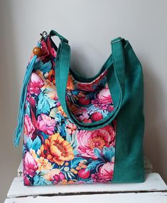 Colorful eco suede bag with floral pattern, Unique clothing accessory, All day carry bag, Large comfortable bag, Womens gift idea, Boho chic This unique bag is the perfect combination of functionality and style. Bag made from high-quality eco suede and adorned with a beautiful floral upholstery velvet. The colorful and eye-catching design of the bag makes it a great addition to any outfit.  It is perfect for everyday use, work, university, a walk, or a meeting with friends. It can also make an e Casual Floral Print Shoulder Bag Perfect For Gift, Trendy Cotton Bags With Floral Print, Green Fabric Bag For Everyday Use, Everyday Green Fabric Bags, Green Fabric Bag For Daily Use, Green Fabric Bags For Daily Use, Everyday Green Fabric Bag, Green Floral Print Shoulder Bag For Summer, Everyday Floral Print Shoulder Bag