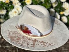 Wedding Custom hand burned wide brimmed Boho Western Hat made to order just for you.  Colors: Cream Sand (Light Tan) Cognac (Dark Tan) When my dad passed away, I made my mom a hat to commemorate him... with places they've traveled, songs they sung, and things that reminded her of him. I loved it so much, I made myself one with my moms favorite Bible verse, my dads ammo casing and so many things I cherish. When I posted them to my friends, I started getting others wanting a special custom hat.  O Western Fedora Hat For Wedding, Handmade Western Cream Hat Band, Western Style Wedding Hat With Flat Brim, Western Flat Brim Wedding Hat, Handmade Cream Western Hat Bands, Western Style Flat Brim Wedding Hat, Cream Handmade Western Hat Bands, Fitted Bohemian Felt Hat For Rodeo, Bohemian Fitted Felt Hat For Rodeo