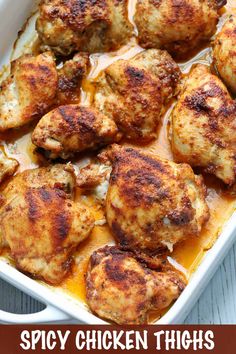 chicken thighs in a white casserole dish on a wooden table with text overlay