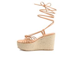 With the Catalinn by Journee Collection, you can bring on the summer vibes. The multi-straps on this tie-up shoe are guaranteed to brighten up your day. Soft vegan leather uppers, a 4 mm Tru Comfort Foam™ footbed, and an espadrille-wrapped platform heel add texture to the design. Luxe Vegan Leather upper, Dainty ankle wrap tie-up design, Approx. 4\ espadrille wrapped platform / wedge, Open Soft Square toe, Tru Comfort Foam™ footbed, Man-made outsole, Caged multi-strap design with knotted detail Tan Wedges, Espadrilles Platform, Ankle Wrap, Famous Footwear, Platform Heel, Platform Wedge Sandals, Platform Wedge, Journee Collection, Strap Design