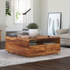 a living room with a coffee table made out of wood