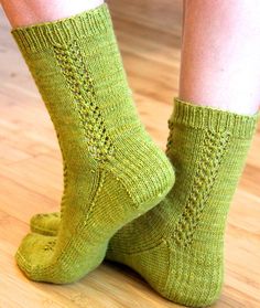 a woman's legs wearing green socks