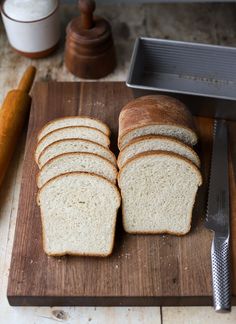 slices of bread sitting on top of a cutting board