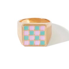 a pink and blue ring with squares on it