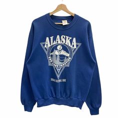 WELCOME ! Thanks For Visiting Our Shop PLEASE READ & KNOW BEFORE YOU DO PAYMENT.      ❗️❗️❗️❗️❗️AAZ❗️❗️❗️❗️❗️ Item :  Alaska Sweatshirt  Made : Usa Measurement :Pit 21.5 inch & Length 26.5 inch Condition:Good No hole , or stain. Selling the best item for you. (( BK02 )) Any PURCHASE or BUNDLE $100 above will get special FREEGIFT  Purchase more item /BUNDLE guys. 💥For FAST shipping ,Add $20 with DHL Express (3-5Day) . 💥Payment with Paypal ONLY❗ . Please double CHECK your sizing because  item ca Alaska Sweatshirt, Alaska The Last Frontier, Vintage Alaska, Inspo Outfit, Sweater Pullover, Vintage Sweatshirt, Crewneck Sweater, Dhl Express