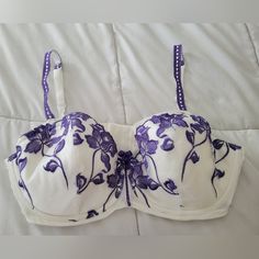 Lace-Lined 40dd Cacique Bra. White Lace With Purple Lace Flower Detail. No Tags But New, Never Worn. Elegant Purple Bra With Lined Body, Elegant Partially Lined Purple Bra, Elegant Purple Lined Bra, Elegant Purple Bra For Spring, Elegant Purple Summer Bra, Lane Bryant Bras, Cacique Bras, Pink Lace Bra, Lounge Bra