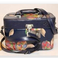 Destination Unknown? That's Just Part Of The Fun! Prep By Organizing All Your Keep-Close Essentials In This Compact And Sturdy Train Case, And Once You Arrive, Devote Less Time To Setting Up Your Stuff And More Time To Exploring. From Patricia Nash. Style: Brescia, Background Navy In Color With Multi Colored Pattern. Can Be Worn As Crossbody Or Carried By Top Handle, Spring Closure (No Key), Signature Hardware, Embossed Logo, Mirror That Snaps Into Lid Or Can Be Removed And Stand On A Table Or C Logo Mirror, Destination Unknown, Brown Leather Satchel, Brown Tote Bag, Black Leather Satchel, Leather Frames, Brown Tote, Train Case, Crossbody Tote Bag