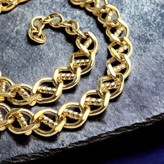 Fabulous Monet signed, bright yellow gold plated unique wide chain link collar necklace.  The necklace measures 16 1/2 - 18 1/2 inches long on the extender X 1/2 inch wide and closes with a simple hook clasp.  The Monet Stamp is on the back of the hook clasp.  This necklace is pristine, like new. Please be sure to look closely at all pictures as I do try to capture the items condition so that you may see any marks or flaws and make an informed decision. All items Shipped from my shop will be tra Collar Chain, Gold Collar, Tree Necklace, Hook Clasp, Collar Necklace, Bright Yellow, Chain Link, Chains Necklace, Favorite Jewelry