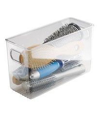 a clear plastic container filled with different types of hair brushes