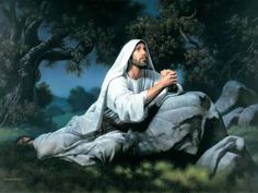 a painting of jesus sitting on the ground in front of some rocks and trees with his hands clasped