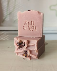 We love this beautifully complex floral scented soap. Notes of jasmine, geranium, orange peel, and pink rose. Our bar soap is made with nourishing plant-based oils like shea butter and hemp oil, which leave skin soft, conditioned, and cleansed. Each bar weighs approximately 4 ounces, and made in small batches. Ingredients: Coconut Oil, Organic Olive Oil, Organic Sunflower Oil, Canola Oil, Castor Oil, Cocoa Butter, Shea Butter, Fragrance, Mica, Kaolin Clay, Rose Petals No palm oil, sulfates, phth Soap Packing Ideas, Pink Soap Bar, Soap Workshop, Soap Notes, Soap Roses, Dessert Soap, Rose Bar, Clay Rose, Handmade Bar