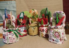 several baskets filled with different types of kitchen utensils