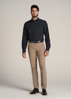 About Our Extra-Long Men's Shirt Reliable and versatile, you can wear this traveler shirt for tall men on any trip, to any meeting, with any outfit. Made of a polyester and spandex blend, it's as comfortable as your favorite tee with the class of a formal dress shirt. It has just the right amount of stretch so you can take it anywhere, whether you're catching flights or taking a big meeting in the boardroom. You want to feel confident in the fit and style of your clothes, which can be hard if yo Cream And Black Outfits Men, Cocktail Mens Attire, Men’s Business Professional, Corporate Men Outfit, Male Teacher Outfits Elementary, Corporate Outfits For Men, Work Attire Men, Formal Office Wear Men, Men’s Wedding Guest Attire