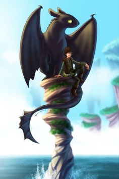 a boy is sitting on top of a dragon