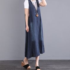 SKU CY-!126343 Material Denim Style Sleeveless, Loose Feature Solid Color Neckline V neck Occasion Vintage, Casual Seasons Spring, Autumn Type Jumpsuit Color Black, Blue Size L, XL, 2XL Size Chart: Please consult the size chart we provide for this item's measurements to help you decide which size to buy. Please note: There may be 1-3cm differ due to manual measurement. CM Bust Length L 110 117 XL 114 118 2XL 118 119 Casual Blue Sleeveless Dress With Pockets, Denim Blue V-neck Jumpsuit For Summer, Summer Denim Blue V-neck Jumpsuit, Casual Cotton Sleeveless Dress, Cotton V-neck Denim Vest For Summer, Casual Blue Sleeveless Dress, Casual Cotton Sleeveless Denim Dress, Casual Sleeveless Cotton Denim Dress, Casual Sleeveless Denim Cotton Dress