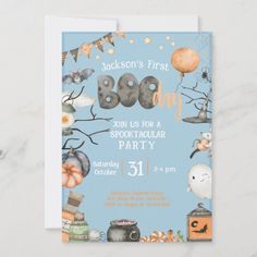 a baby shower party with balloons, bats and pumpkins on blue paper that says boo