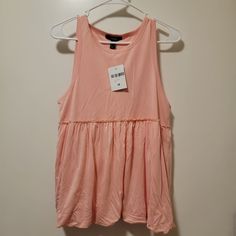 Forever 21 Sleeveless Shirt. Pink Size Medium. New With Tags. Summer Tank Top Vest, Casual Summer Camisole Vest, Casual Tank Vest For Summer, Trendy Spring Sleeveless Tank Top, Summer Sleeveless Blouse Vest For Day Out, Trendy Tank Blouse For Summer, Summer Sleeveless Vest For Day Out, Sleeveless Blouse Vest For Summer Day Out, Trendy Sleeveless Cotton Blouse